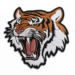 Fototapeta premium Embroidered growling tiger head patch on white background