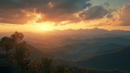 Obraz premium Majestic Sunset Overrolling Hills and Mountains with Colorful Sky and Golden Sunlight Illuminating the Landscape