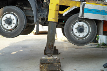 Hydraulic supports for the crane legs.Crane outrigger pad. Stability and safety of wheeled vehicles...