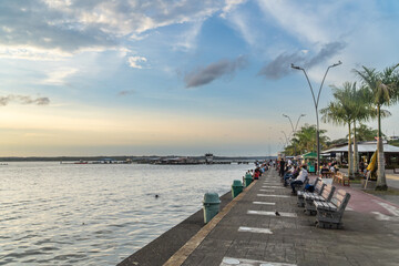 Boardwalk by the sea at sunset. Malec&oacute;n de Buenavenura