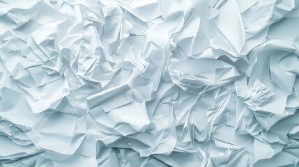 A pile of crumpled white papers, textured background. Perfect for concepts of ideas, failure, or waste.
