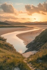 Serene sunset over a meandering river flowing into a sandy beach, viewed from a grassy hilltop.