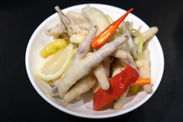 Pickled Chicken Feet close up. Spicy Chinese food