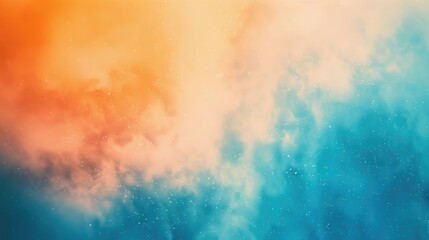 Obraz premium Abstract blurred background with a grainy gradient in blue and orange colors. A soft and gentle gradient of the sky at sunset