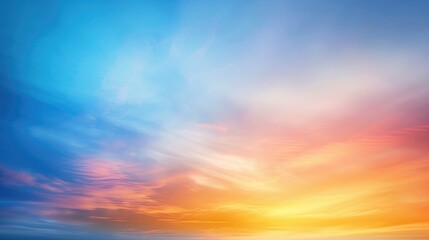 Obraz premium Abstract blurred background with a grainy gradient in blue and orange colors. A soft and gentle gradient of the sky at sunset