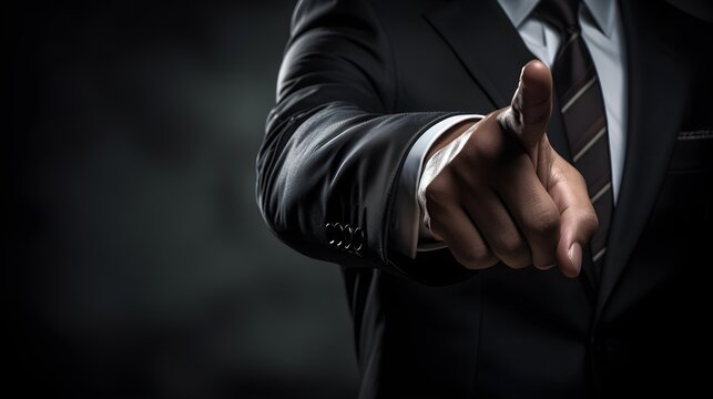 Close up of a businessman s hand pointing assertive gesture dark suit corporate power
