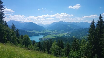 Fototapeta premium A scenic view of mountains and a lake under a clear blue sky.