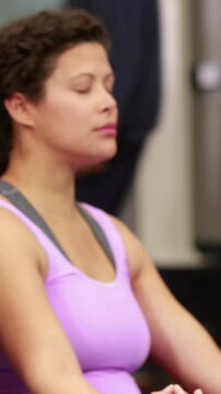 Pregnant women in fitness studio