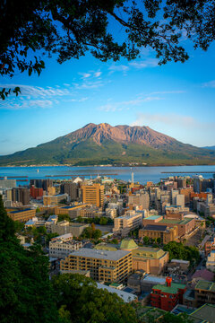 Sakurajima, an active stratovolcano, viewed from Shiroyama observation deck with Kagoshima city in Kyushu, Japan