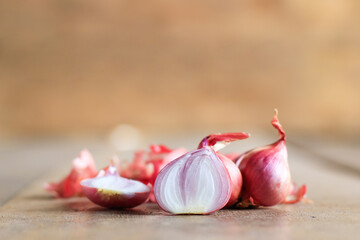 red onion on wooden table background