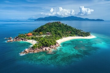 Fototapeta premium Aerial shot of a tropical island with palm trees and white sandy beaches