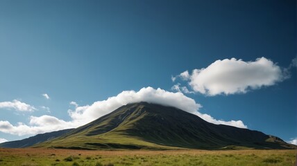 Fototapeta premium there is a large mountain with a cloud in the sky