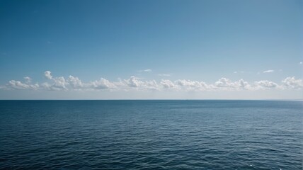 Obraz premium there is a boat out on the water with a sky background