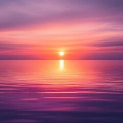 Fototapeta premium A serene sunset over calm waters, blending shades of pink and orange in the sky. The tranquil scene reflects a moment of peace and natural beauty, perfect for relaxation imagery.