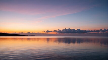 Naklejka premium arafed view of a calm lake with a sunset in the background