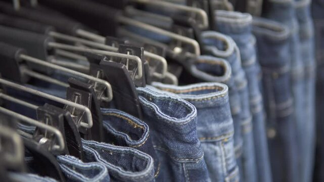 Closeup view of row of jeans at a mass market store
