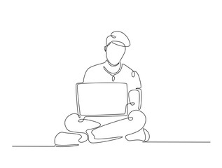Continuous line art drawing of a man sitting on the floor and working on a laptop. Person working on a laptop, freelance,remote work,study in line art drawing vector illustration. Editable stroke.