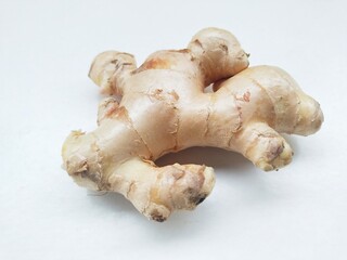 Close-up of ginger (Zingiber Officinale) on a white background.