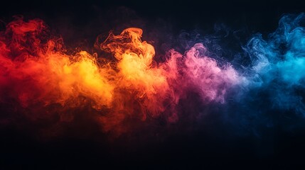 Fototapeta premium Colorful smoke swirls on black background, studio shot, abstract design element