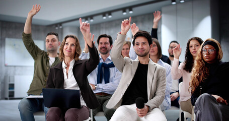 Diverse group of business professionals attending educational seminar