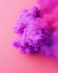 Fototapeta premium Vibrant pink and purple powder bursts, creating a striking visual effect.