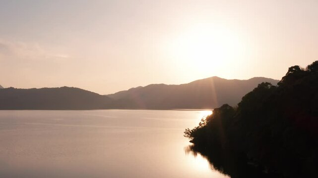 Aerial Sunset View Over Lake Ikeda in Kagoshima, Japan