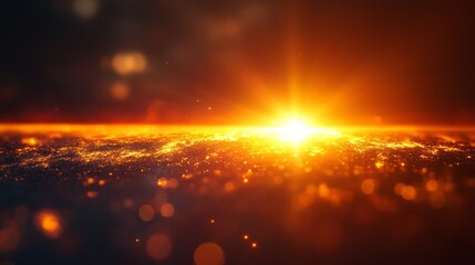 Fototapeta premium Vibrant orange sunrise over glittering horizon.