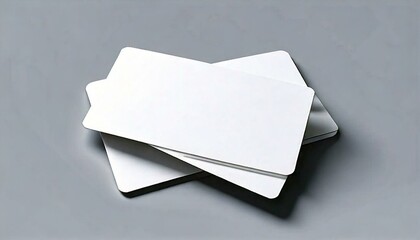 白無地の名刺のモックアップ素材の写真。グレーの背景。