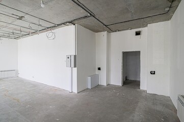 rough repairs for self-finishing. interior decoration, bare walls of the room, stage of...