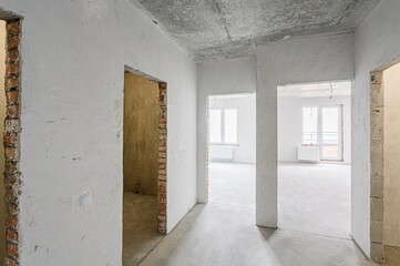 rough repairs for self-finishing. interior decoration, bare walls of the room, stage of...