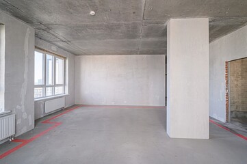 rough repairs for self-finishing. interior decoration, bare walls of the room, stage of construction. interior apartment room