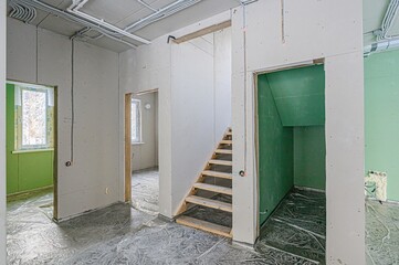 rough repairs for self-finishing. interior decoration, bare walls of the room, stage of construction. interior apartment room