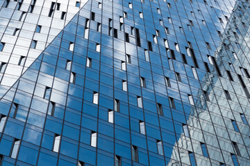Skyscraper windows close-up. Window frames of demo-scrapers.