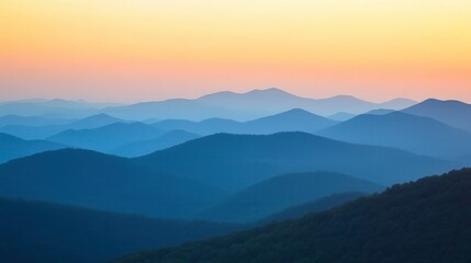 Serene Mountain Range at Dawn Against Colorful Sky