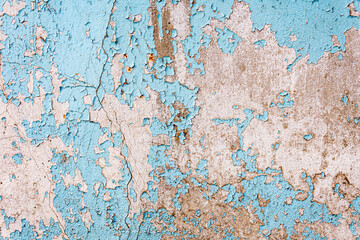 Weathered painted blue wall as a texture