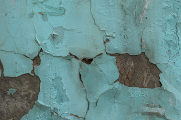 Weathered painted blue wall as a texture