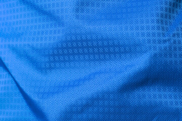 Blue wrinkled synthetic ripstop fabric as texture, background