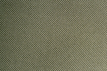 Ribbed green surface of a camping mat as texture, background