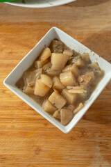 A view of a small bowl of baked kohlrabi.