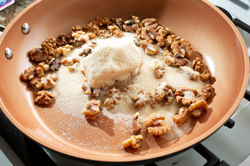 A view of the process of making candied walnuts.