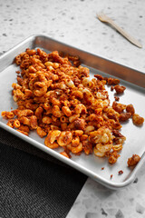 A view of a baking sheet of chorizo mac n cheese.