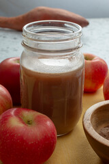 A view of a protein shake in a glass mason jar.