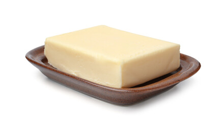 Block of tasty butter in dish isolated on white