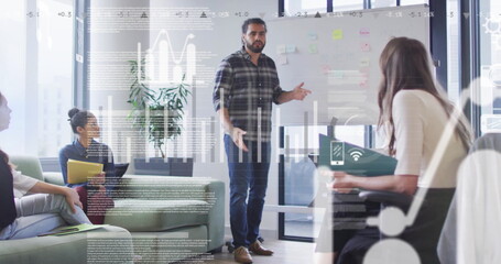 Image of data processing and media icons over diverse colleagues discussing work in office