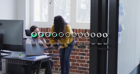 Image of financial data processing over diverse business people in office