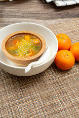 A view of a small bowl of spaghetti squash soup.