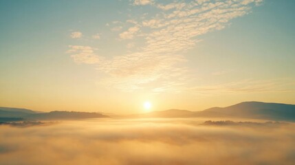 serene sunrise over misty mountains