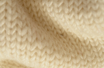 Soft Beige Wool Knitted Fabric Texture Close-up