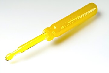 Fototapeta premium Close-up shot of a yellow toothbrush on a white surface, perfect for health and wellness illustrations