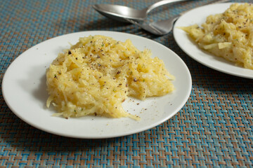 A view of a plate of spaghetti squash Alfredo.
